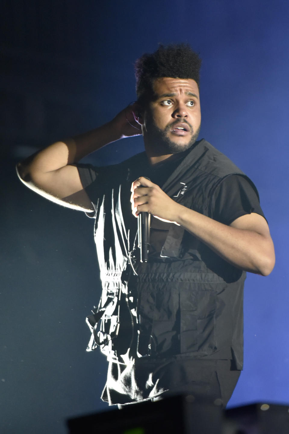 FILE - The Weeknd performs on day three at Lollapalooza in Chicago on Aug 4, 2018. The Weeknd, who was nominated for eight American Music Awards, was completely shut out of the Grammys, earning zero nominations despite having a No. 1 album. (Photo by Rob Grabowski/Invision/AP, File)