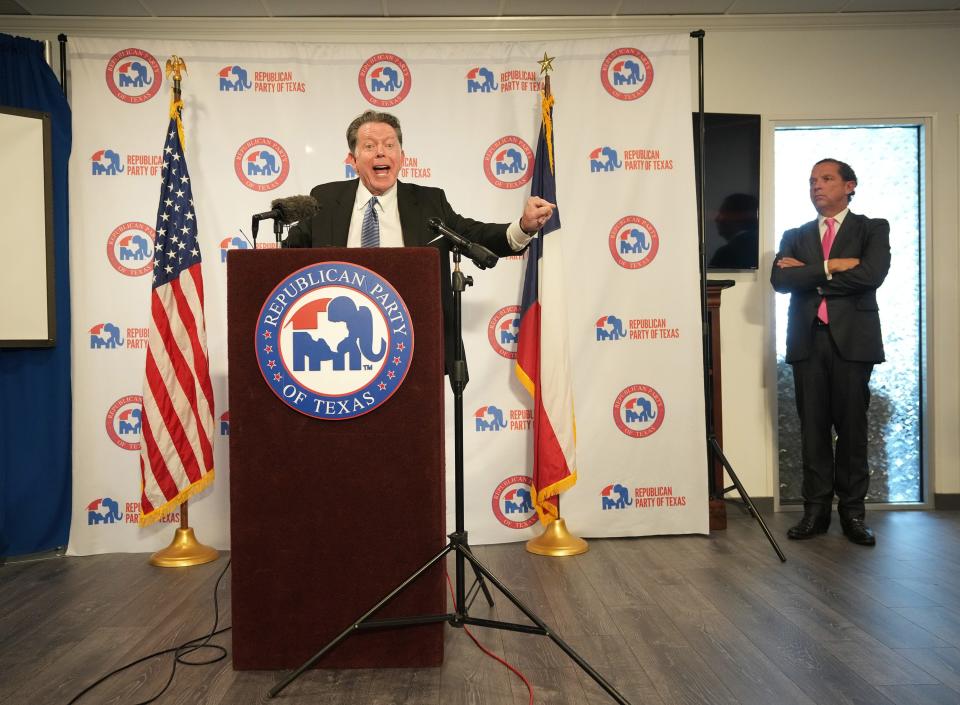 Dan Cogdell joins Attorney General Ken Paxton’s other attorney, Tony Buzbee, right, in addressing Wednesday's news conference about the Senate impeachment trial.