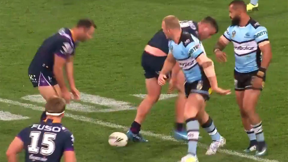 Luke Lewis walks out of marker, towards the scuffle. Pic: Getty