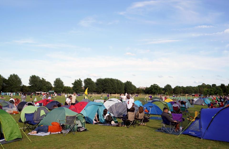 Campers form the overnight queue ahead of the 2022 Wimbledon Championship (Zac Goodwin/PA) (PA Wire)