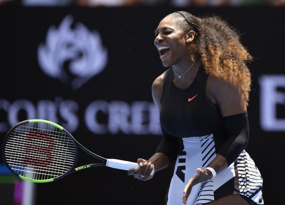 United States' Serena Williams yells out while playing Switzerland's Belinda Bencic during their first round match at the Australian Open tennis championships in Melbourne, Australia, Tuesday, Jan. 17, 2017. (AP Photo/Andy Brownbill)