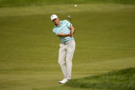 Jordan Spieth hits from the fairway on the 13th hole during a practice around for the PGA Championship golf tournament at Oak Hill Country Club on Tuesday, May 16, 2023, in Rochester, N.Y. (AP Photo/Eric Gay)