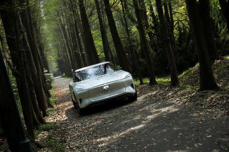 An Infiniti electric concept car called the Qs Inspiration is seen during a commercial shoot for a car advertisement in Shanghai, China April 8, 2019. REUTERS/Aly Song