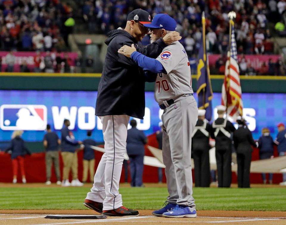 Cleveland manager Terry Francona talks to Chicago manager Joe Maddon before Game 1 of the World Series, Tuesday, Oct. 25, 2016, in Cleveland.