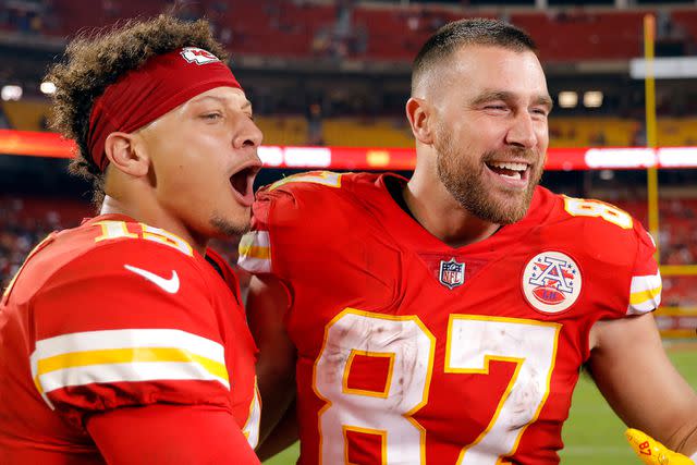 <p>David Eulitt/Getty</p> Patrick Mahomes #15 and Travis Kelce #87 of the Kansas City Chiefs celebrate