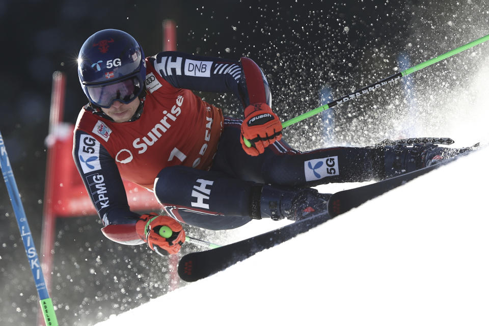 Norway's Henrik Kristoffersen speeds down the course during an alpine ski, men's World Cup giant slalom race, in Adelboden, Switzerland, Saturday, Jan. 7, 2023. (AP Photo/Gabriele Facciotti)