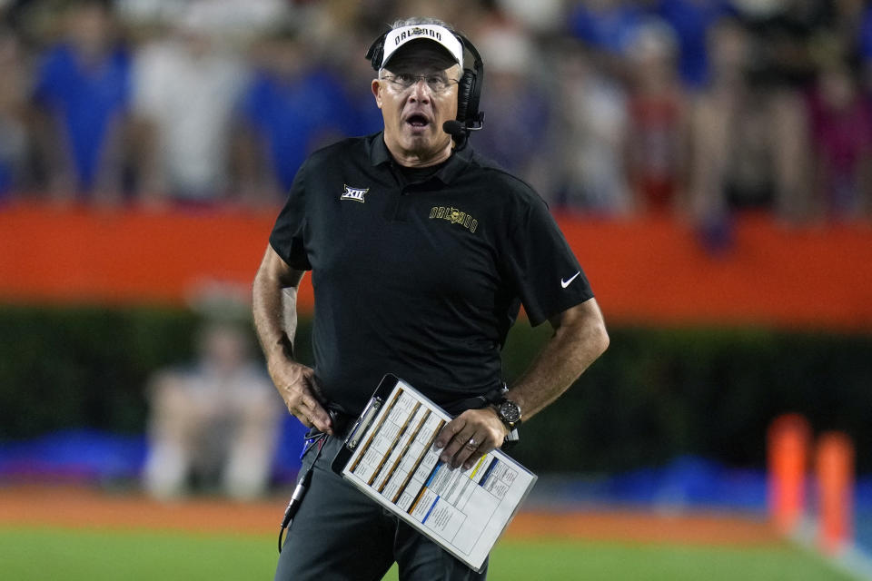 Central Florida head coach Gus Malzahn paces the sidelines during the first half of an NCAA college football game against Florida, Saturday, Oct. 5, 2024, in Gainesville, Fla. (AP Photo/John Raoux)