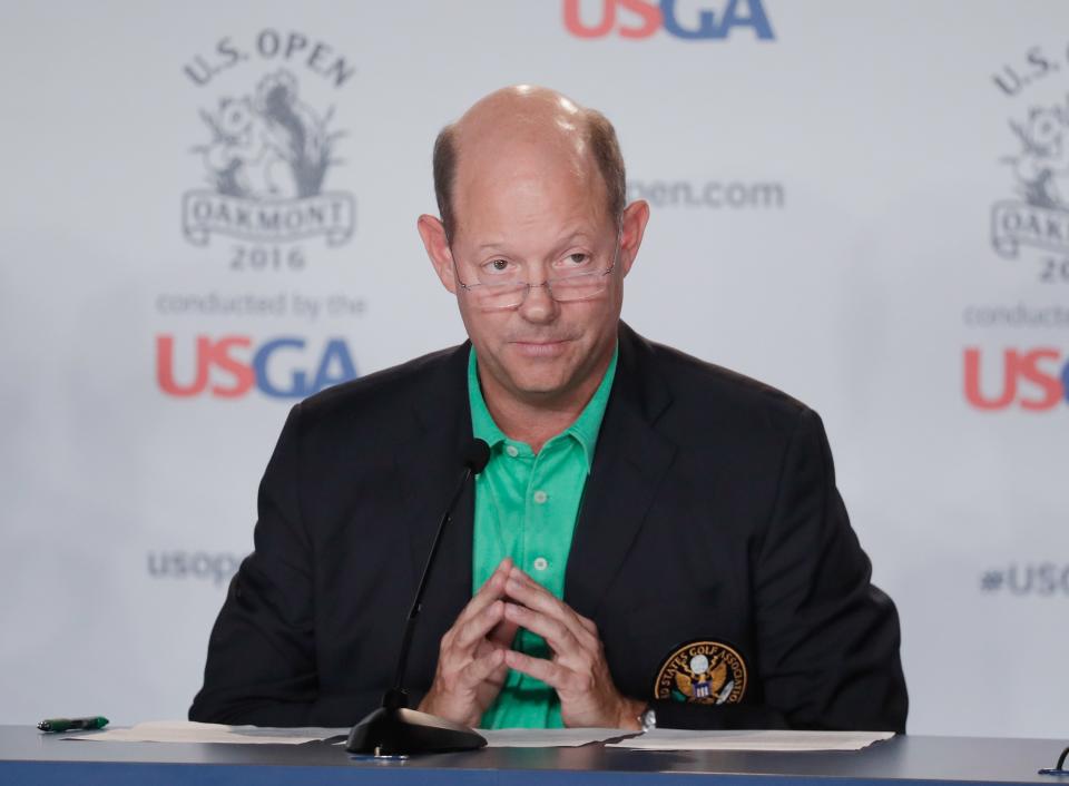 OAKMONT, PA - JUNE 15:  USGA executive director Mike Davis speaks with the media during a practice round prior to the U.S. Open at Oakmont Country Club on June 15, 2016 in Oakmont, Pennsylvania.  (Photo by Rob Carr/Getty Images)