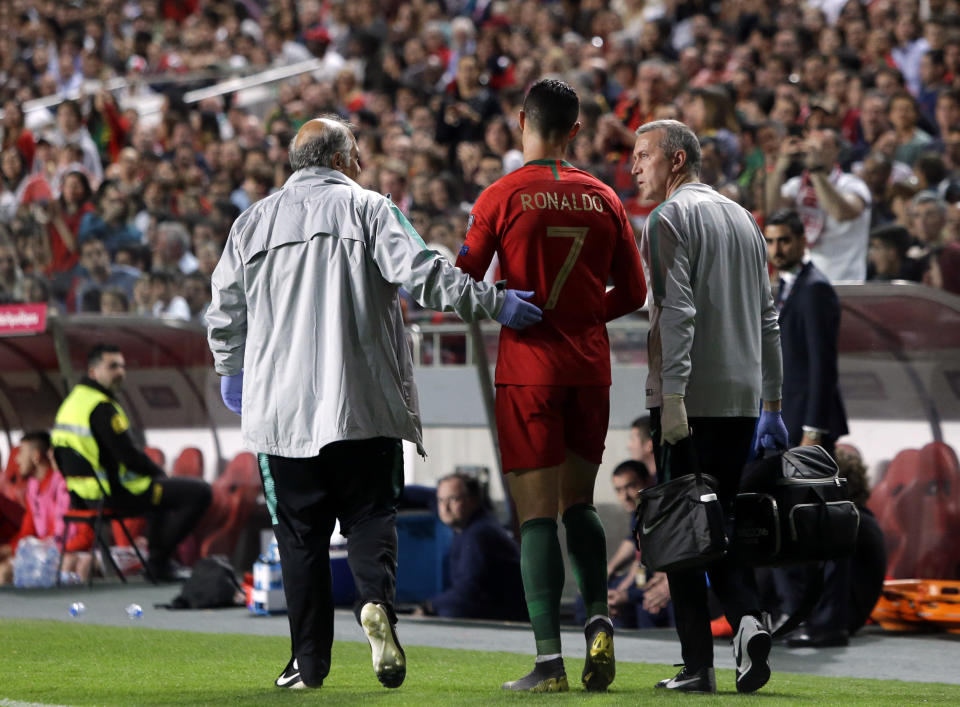 Portugal's Cristiano Ronaldo leaves the pitch during the Euro 2020 group B qualifying soccer match between Portugal and Serbia at the Luz stadium in Lisbon, Portugal, Monday, March 25, 2019. (AP Photo/Armando Franca)