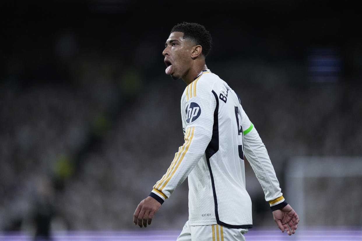 Real Madrid's Jude Bellingham reacts during the Spanish La Liga soccer match between Real Madrid and Atletico Madrid at the Santiago Bernabeu stadium in Madrid, Spain, Sunday, Feb. 4, 2024. (AP Photo/Bernat Armangue)