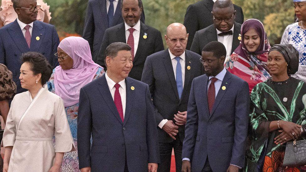 China's President Xi Jinping and his wife Peng Liyuan get ready to pose for a group photo together with African leaders at the Focac summit in Beijing, China - 4 September 2024