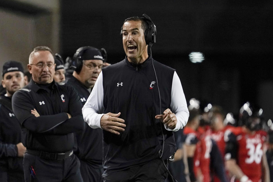 Cincinnati head coach Luke Fickell stands on the sidelines during the second half of an NCAA college football game against Tulsa Saturday, Nov. 6, 2021, in Cincinnati. (AP Photo/Jeff Dean)