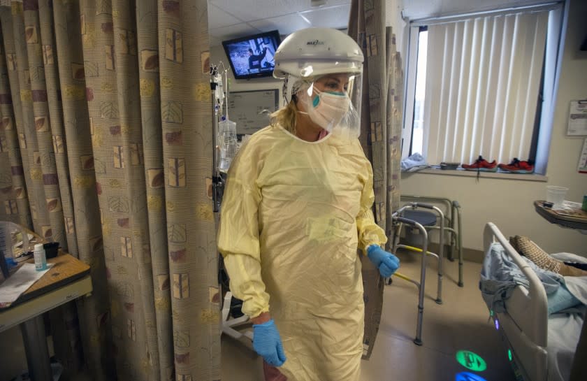 TORRANCE, CA - JULY 30: Courtney Herron, RN is working in the covid unit inside Little Company of Mary Medical Center Friday, July 30, 2021 in Torrance, CA. Today the hospital has 20 covid positive patients. In June they had none. The majority of their covid positive cases are non vaccinated patients. (Francine Orr / Los Angeles Times)