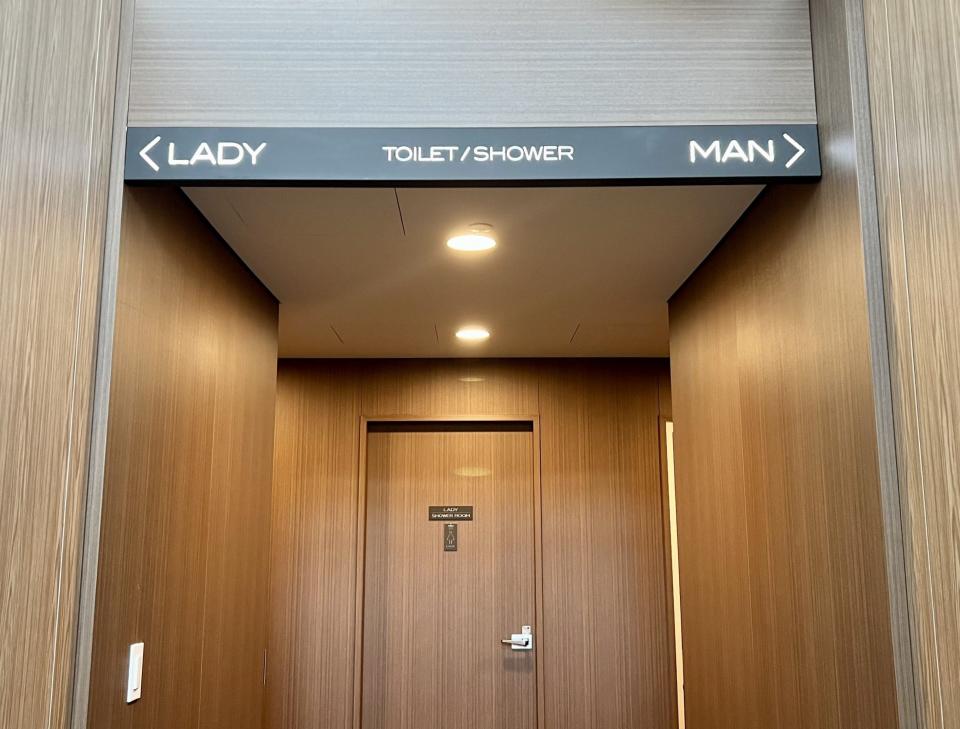 Entrance to the women and men's showers in the capsule hotel.