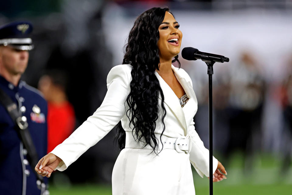 Feb 2, 2020; Miami Gardens, Florida, USA;  Recording artist Demi Lovato performs the national anthem before Super Bowl LIV between the San Francisco 49ers and the Kansas City Chiefs at Hard Rock Stadium. Mandatory Credit: Matthew Emmons-USA TODAY Sports
