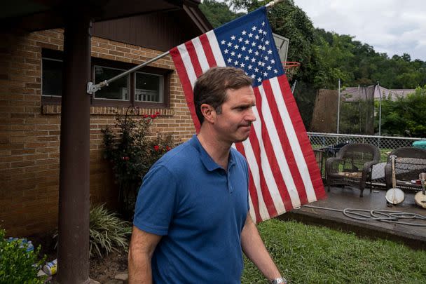 PHOTO: Kentucky Governor Andy Beshear visits a house with flood damage in the city, July 31, 2022, in Whitesburg, Ky.  (Michael Swensen/Getty Images)