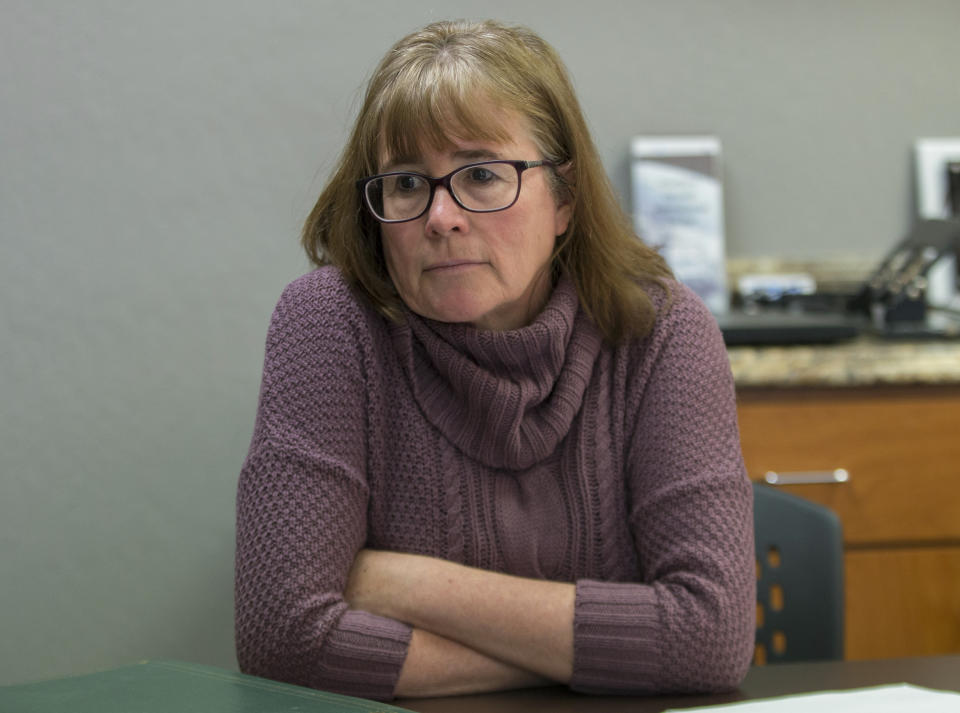 In this Monday, Feb. 11, 2019 photo, Carina Black sits in her office in Reno, Nev. Black, the longtime director of the international center at the University of Nevada in Reno, is the latest woman to accuse Nobel Peace Prize winner and former Costa Rican President Oscar Arias of sexual misconduct. (AP Photo/Tom R. Smedes)