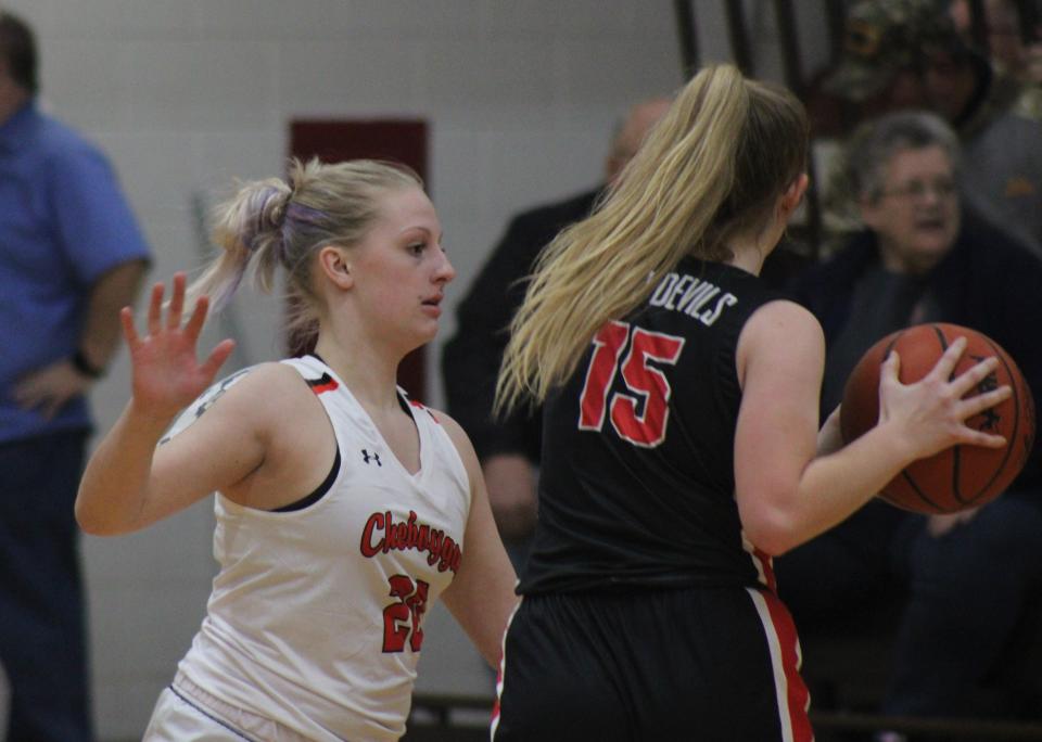 Cheboygan junior Ciara Ramsby (left) defends East Jordan's Alley Whiteford (15) late in the fourth quarter on Monday.