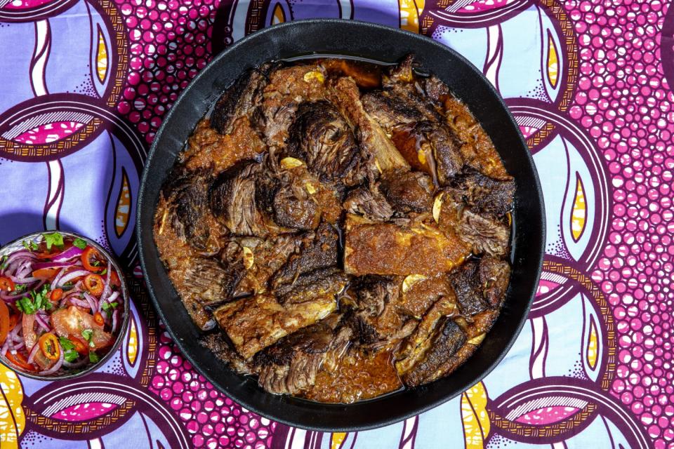 Moju blends her Kenyan-Maasai and Nigerian heritages in this dish of beef short ribs braised in a tomato and red pepper stew.