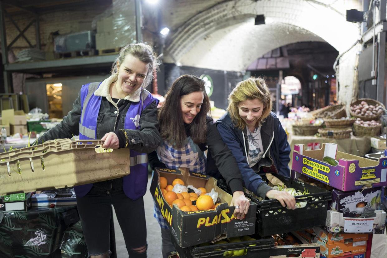 Plan Zheroes' (l-r) Natasha Starr, Laura Hopper and Hannah Thomas collect surplus food at Borough Market: Vicki Couchman