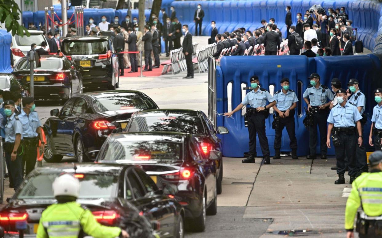 China opened a new office for its security agents to operate openly in Hong Kong transforming a hotel into the force's headquarters - AFP