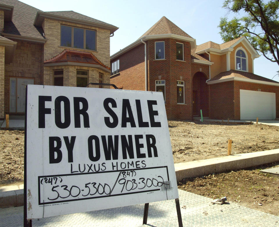 A growing number of homeowners who could be selling are opting to stay put, according to the National Association of Realtors. Mortgage-holders that refinanced at record-low mortgage rates during the last two years are now hesitant to give up comfortable mortgage payments as rates top 5%. (Photo by Tim Boyle/Getty Images)