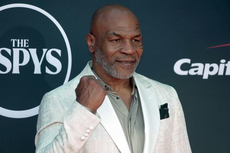 Mike Tyson arrives on the red carpet before the 2023 ESPYS at the Dolby Theatre in Los Angeles.