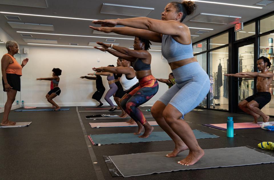 Warnell Henderson, 69, leads a Hot Room yoga class called One Breath on Saturday, July 3. The class, new this year, is intended to be specifically for people of color as Indianapolis' yoga scene seeks to diversify.