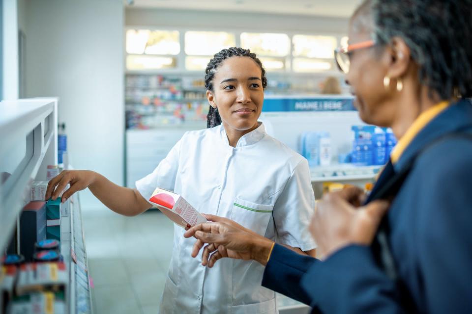 Pharmacists and other health care professionals can help patients decipher complex drug names. <a href="https://www.gettyimages.com/detail/photo/young-pharmacist-helping-a-senior-lady-choose-the-royalty-free-image/1352510394" rel="nofollow noopener" target="_blank" data-ylk="slk:Marko Geber/DigitalVision via Getty Images;elm:context_link;itc:0;sec:content-canvas" class="link ">Marko Geber/DigitalVision via Getty Images</a>