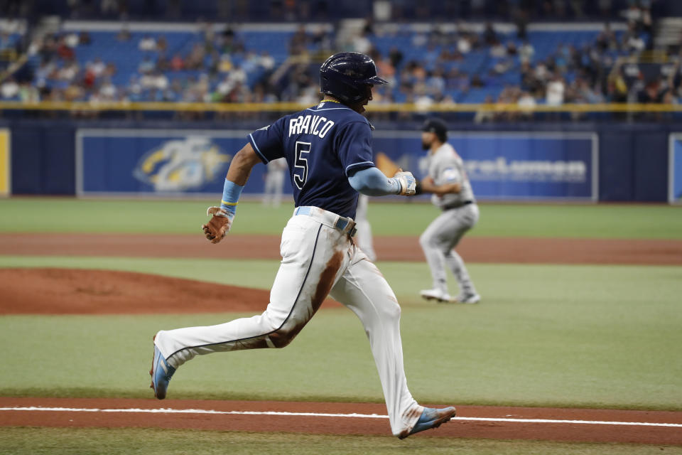 Tampa Bay Rays' Wander Franco runs down the third baseline to score on an RBI-triple by Randy Arozarena against the Houston Astros during the first inning of a baseball game Monday, April 24, 2023, in St. Petersburg, Fla. (AP Photo/Scott Audette)
