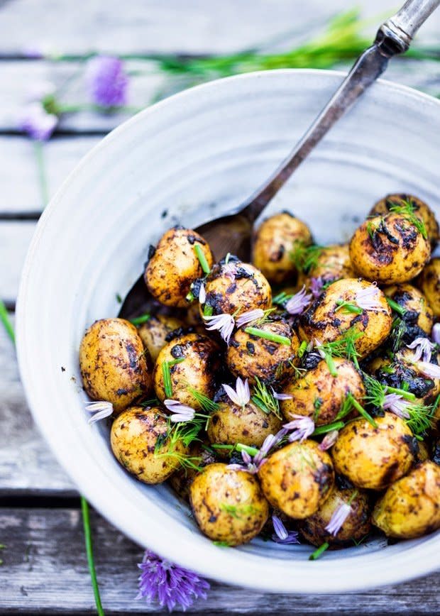 <strong>Get the <a href="http://www.feastingathome.com/grilled-potato-salad-with-black-garlic-vinaigrette/" target="_blank">Grilled Potato Salad Recipe with Black Garlic Vinaigrette and Dill Cream recipe</a> from Feasting at Home</strong>