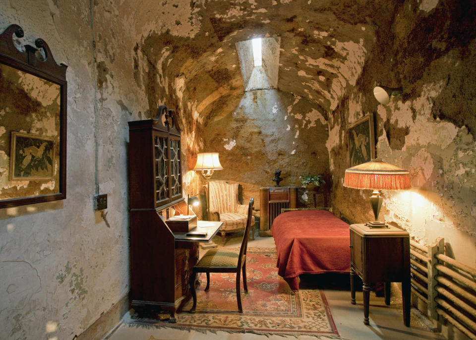 Al Capone's concrete cell with small bed and desk