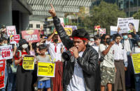 An anti-coup protester shouts slogans in Yangon, Myanmar Thursday, Feb. 25, 2021. Social media giant Facebook announced Thursday it was banning all accounts linked to Myanmar’s military as well as ads from military-controlled companies in the wake of the army’s seizure of power on Feb. 1.(AP Photo)