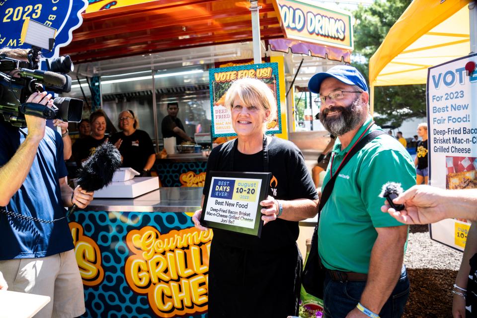 Joni Bell of What's Your Cheez wins 2023 Best New Food for the deep-fried bacon brisket mac-n-cheese during day seven of the Iowa State Fair on Wednesday, August 16, 2023 in Des Moines.
