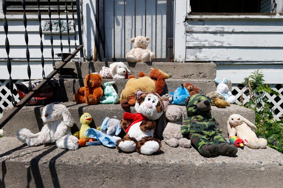 Stuffed animals were placed by kids from across the street at the home where a 3-year-old boy was found dead inside a freezer at the home on Monte Vista Street in Detroit on June 24, 2022.
A 30-year-old woman was taken into custody, by the Detroit Police Department.