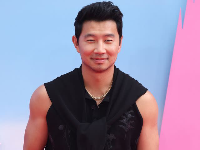 <p>Neil Mockford/FilmMagic</p> Simu Liu attends the "Barbie" European premiere at Cineworld Leicester Square on July 12, 2023 in London, England.