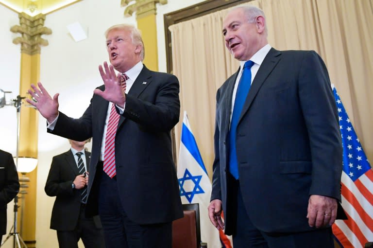 US President Donald Trump reacts to a reporter's question after he and Israeli Prime Minister Benjamin Benjamin Netanyahu spoke to the press ahead of a bilateral meeting at a hotel in Jerusalem on May 22, 2017