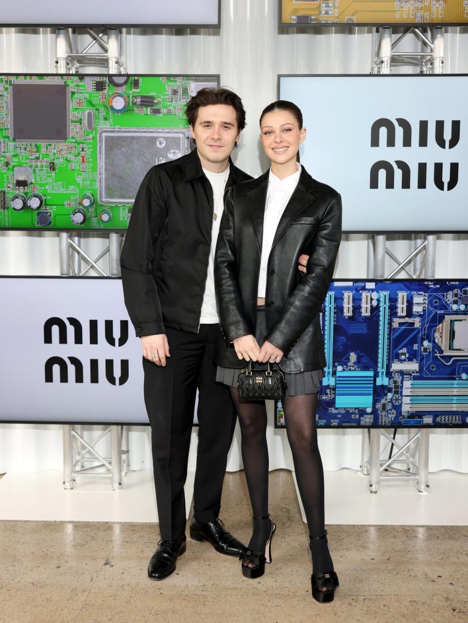 Brooklyn and Nicola Peltz Beckham (Getty Images for Miu Miu)