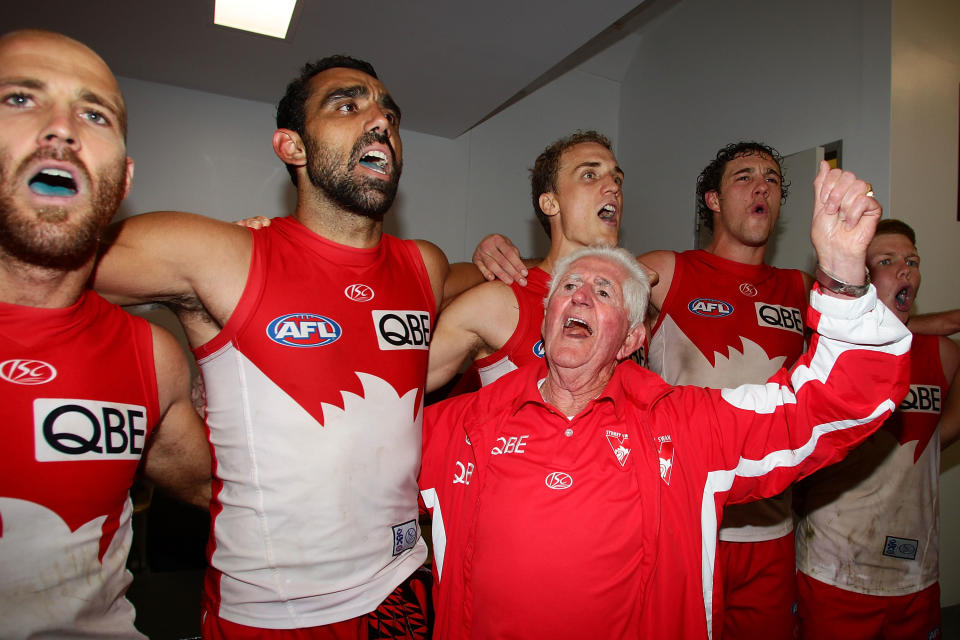 Kenny Williams, pictured here leading Swans players in their club song after a win in 2010.