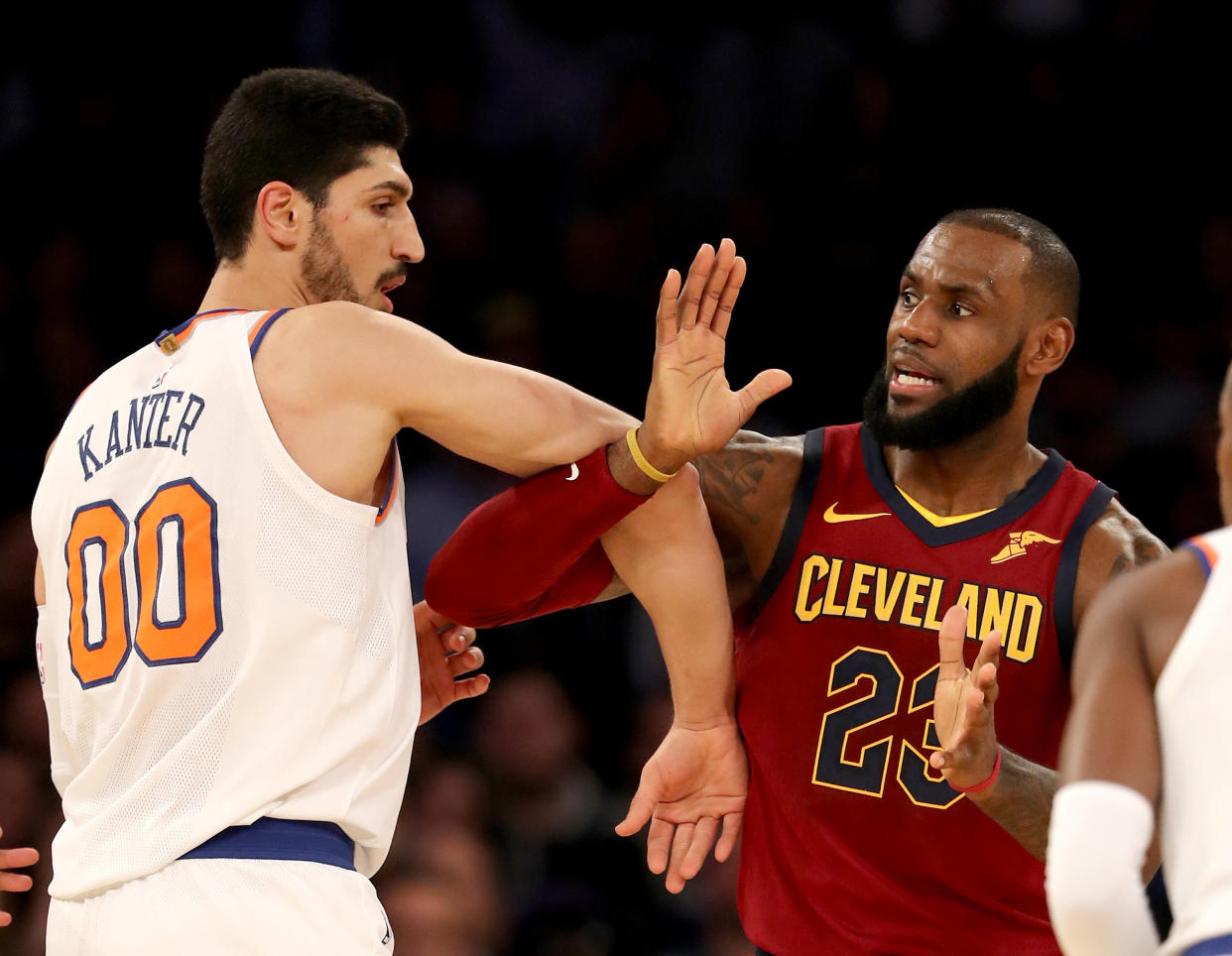 Enes Kanter and LeBron James fight for position during the Cleveland Cavaliers' 104-101 victory. (Photo: Elsa via Getty Images)