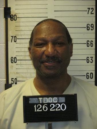 This booking photo provided by the Tennessee Department of Corrections via their Flickr page shows Byron Black. Tennessee's conservative attorney general and Nashville's liberal district attorney are at odds over the possible commutation of a death sentence, in this case whether an inmate is intellectually disabled, precluding him from being executed. The case involves Black, a 66-year-old inmate convicted in the 1988 shooting deaths of girlfriend Angela Clay, 29, and her two daughters, Latoya, 9, and Lakeisha, 6. (Tennessee Department of Corrections via AP)