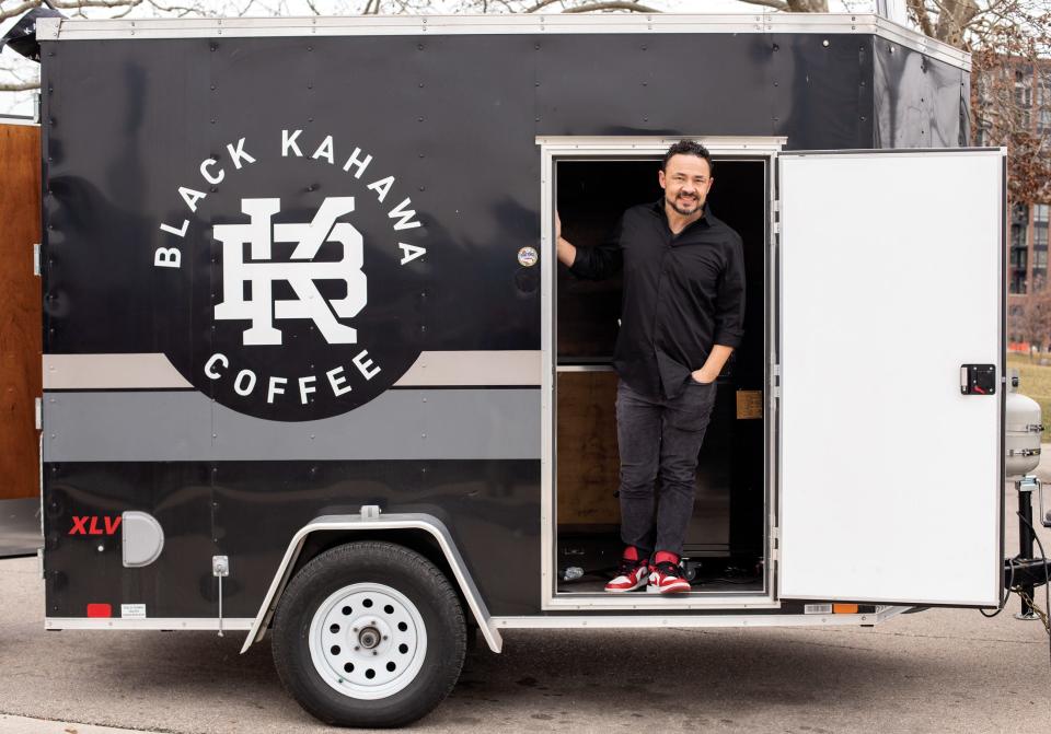 Black Kahawa Coffee founder Douglas Buckley roasts and serves coffee from a mobile trailer.