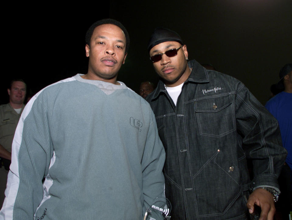 Rap artists Dr. Dre and LL Cool J pose backstage after the 2000 Radio Music Awards at the Aladdin Hotel in Las Vegas, 11/04/00.
