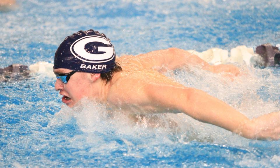 Granville's Miles Baker swims the butterfly in the 200 individual medley during the Division II sectional championships at Kenyon College on Saturday, February 10, 2024.