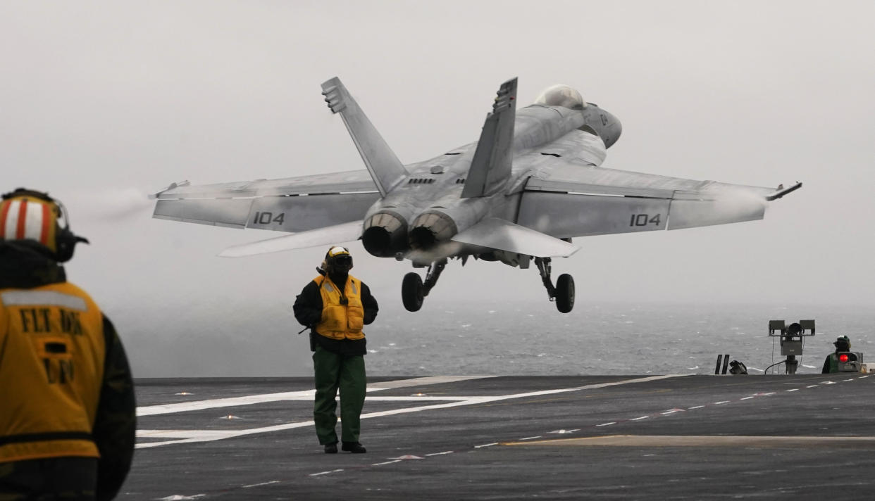 A fighter jet is launched from the deck of the Ford during flight deck operations in Virginia in 2022.