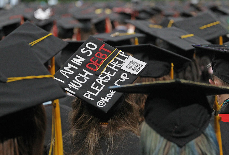 BOSTON, MA - MAY 3: The reality of college tuition debt was on display at the Northeastern University graduation at the TD Garden on May 03, 2019. (Photo by Suzanne Kreiter/The Boston Globe via Getty Images)