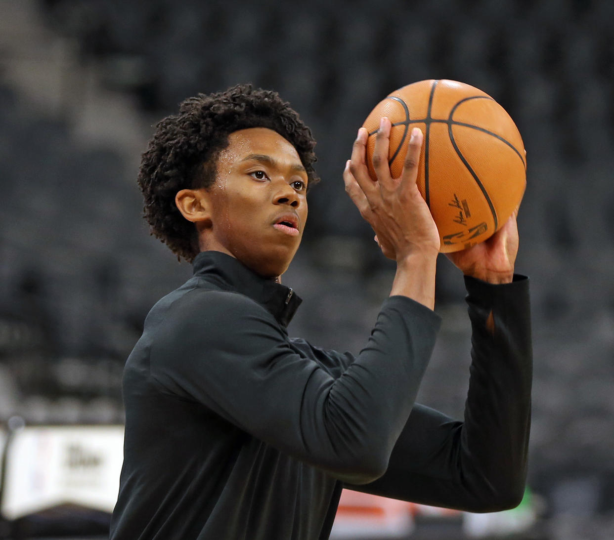 SAN ANTONIO, TX - JANUARY 12: Josh Primo #11 of the San Antonio Spurs warms up before a game against the Houston Rockets at AT&T Center on JANUARY 12, 2022 in San Antonio, Texas.  NOTE TO USER: User expressly acknowledges and agrees that , by downloading and or using this photograph, User is consenting to the terms and conditions of the Getty Images License Agreement. (Photo by Ronald Cortes/Getty Images)