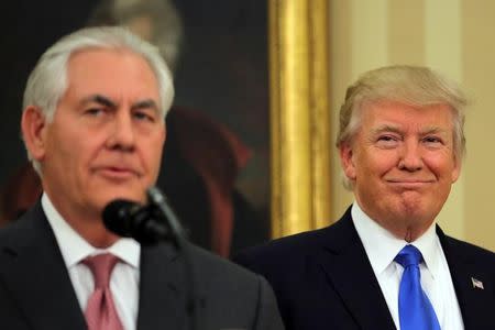 U.S. President Donald Trump attends the swearing-in ceremony of the new U.S. Secretary of State Rex Tillerson at the Oval Office of the White House in Washington, U.S., February 1, 2017. REUTERS/Carlos Barria