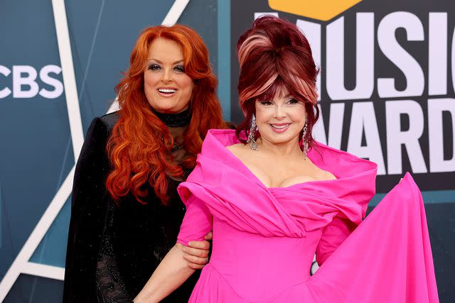 <p>Jason Kempin/Getty</p> Wynonna and Naomi Judd in April 2022