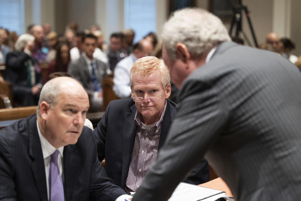 Alex Murdaugh and his attorneys prepare for his trial for murder at the Colleton County Courthouse on Tuesday, Jan. 31, 2023 in Walterboro, S.C. Murdaugh, 54, is standing trial on two counts of murder in the shootings of his 52-year-old wife and 22-year-old son. Murdaugh faces 30 years to life in prison if convicted. (Joshua Boucher/The State via AP, Pool)